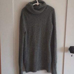 Gray turtleneck sweater.